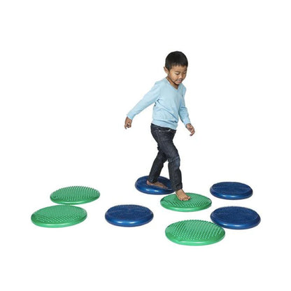 Child walking on Elizabeth Richards Wriggle Cushions