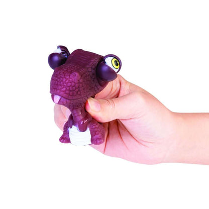 Hand squeezing Eye Popping Dino in Purple