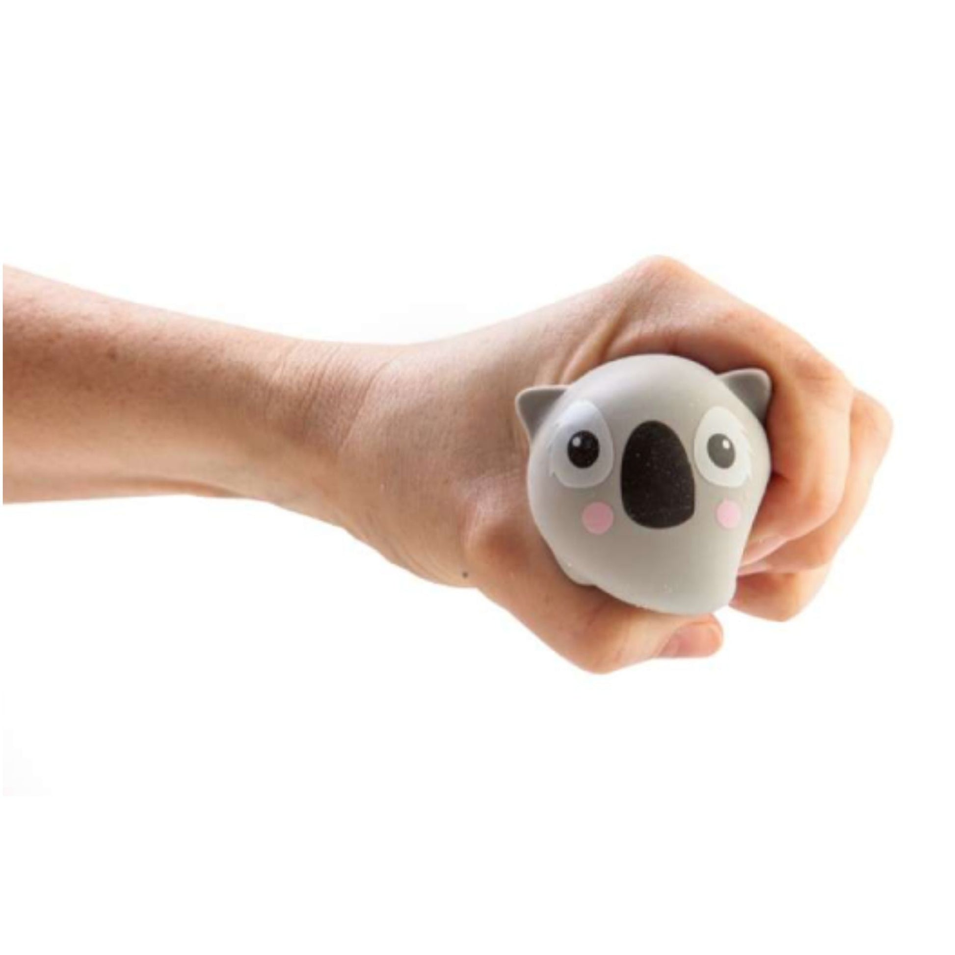 Hand squishing a Smooshos Pets Squishy Koala Toy