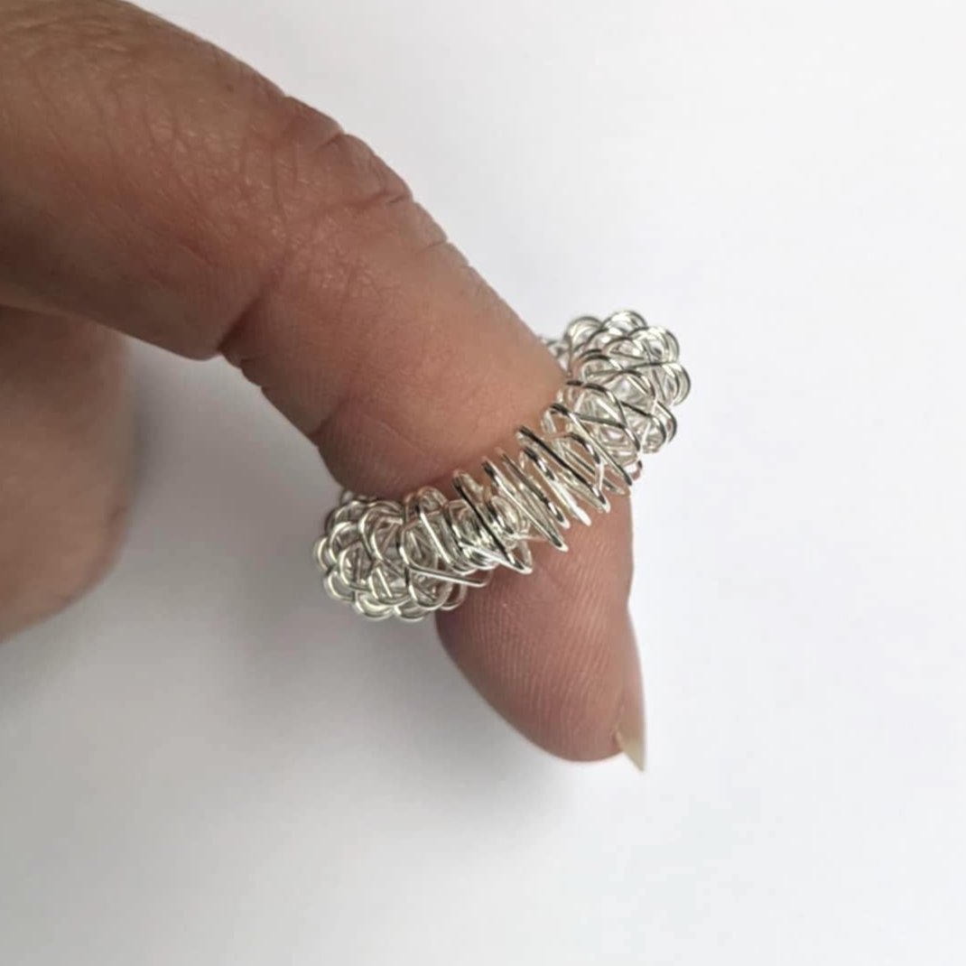 Spiky Sensory Finger Ring on a finger